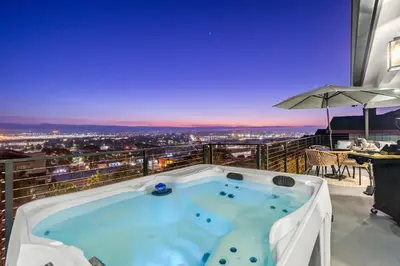 a hot tub on the balcony of a building at The California III in San Diego