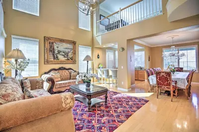a living room with a couch and a table at Luxury San Diego Home with Pool, Spa and Views! in San Diego
