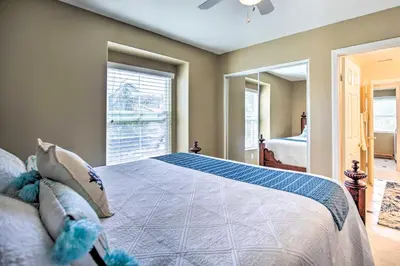 a bedroom with a bed and a large window at Luxury San Diego Home with Pool, Spa and Views! in San Diego