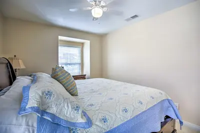 a bedroom with a bed and a ceiling fan at Luxury San Diego Home with Pool, Spa and Views! in San Diego