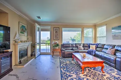 a living room with a couch and a coffee table at Luxury San Diego Home with Pool, Spa and Views! in San Diego