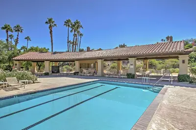 a swimming pool in front of a house with a gazebo at Roadrunner Roost at Rams Hill Golf Resort! in Borrego Springs