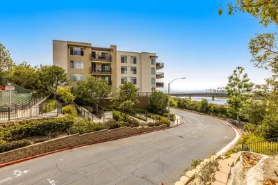 an empty street in front of a building at Seacliff Retreat in Oceanside