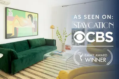 a living room with a green couch and a sign at Avalon 2 Unit Buyout II IV by AvantStay Mins to Gaslamp Patio w BQQ in San Diego