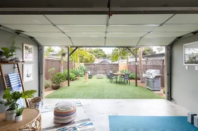 an open patio with a yard with a grill at Oliver by AvantStay Summer Escape Beach House 4 Blcks from Ocean in San Diego