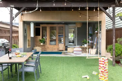 a patio with a table and chairs on grass at Oliver by AvantStay Summer Escape Beach House 4 Blcks from Ocean in San Diego