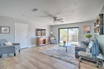 a living room with a couch and a ceiling fan at Hilltop Hideaway in Temecula Wine Country in Sage