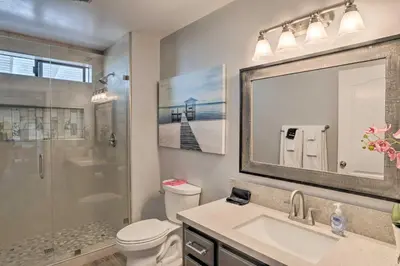 a bathroom with a toilet and a sink and a shower at Hilltop Hideaway in Temecula Wine Country in Sage