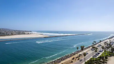 an aerial view of a beach and the ocean at Mission Point Buyout by AvantStay Two Unit Buyout w Patio Fire Pit Close to Beach 6BDRs in San Diego