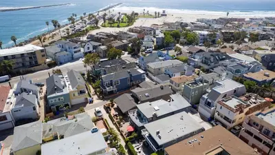 an aerial view of a city and the beach at Mission Point 2 by AvantStay Mission Beach Home w Large Balcony Steps to Beach in San Diego
