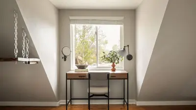 a table with a chair in front of a window at Chateau Syrah by AvantStay Picturesque Estate w Pool Hot Tub Table Tennis Pool Table New Pickleball Court Basketball hoop in Temecula
