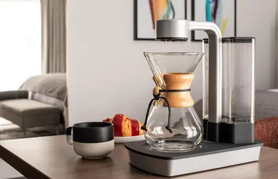 a coffee maker and a cup on a table at Orli La Jolla in San Diego