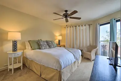 a bedroom with a bed and a ceiling fan at Borrego Springs Retreat with Grill and Patio! in Borrego Springs
