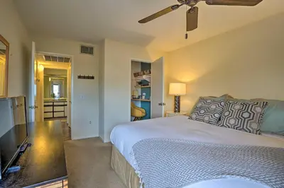 a bedroom with a bed and a ceiling fan at Borrego Springs Retreat with Grill and Patio! in Borrego Springs