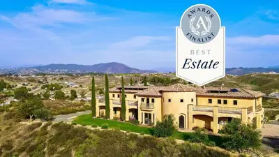 a house on a hill with the words best estate at Palazzo Del Sol By AvantStay Breathtaking Home w Mountain Views Hot Tub in Temecula