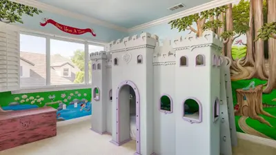 a childs bedroom with a castle mural at Grand Contento by AvantStay Extraordinary Estate w Pool Movie Room in Temecula
