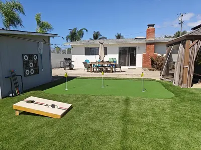 a yard with a miniature golf course in the grass at Golf - Beach - Legoland - Shopping - Dining in Carlsbad