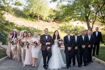 a bride and groom and their wedding party at Inn at Churon Winery in Temecula