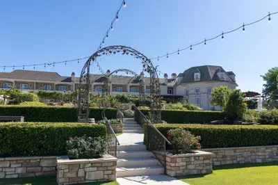 a house with a garden and a stairway at Inn at Churon Winery in Temecula