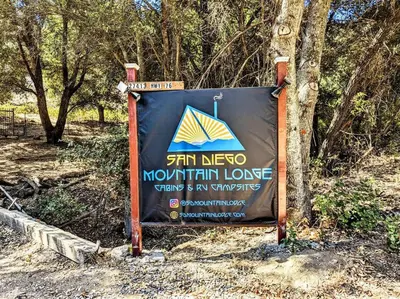 a sign for the spin mexico mountain lodge at The Luminous Lodge-Remodeled Cabin W/ Valley Views in Santa Ysabel