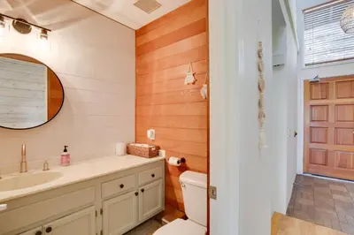 a bathroom with a toilet and a sink at La Mesa Townhome 15 Mi to San Diego! in La Mesa