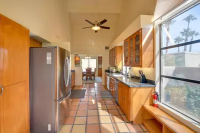 a kitchen with a stainless steel refrigerator and a window at Pet-Friendly Borrego Springs Retreat in Borrego Springs