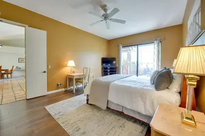 a bedroom with a bed and a window and a table at Pet-Friendly Borrego Springs Retreat in Borrego Springs