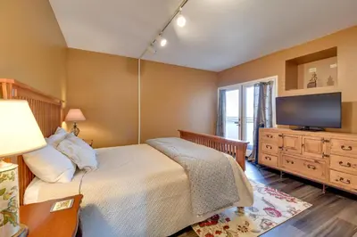 a bedroom with a bed and a flat screen tv at Pet-Friendly Borrego Springs Retreat in Borrego Springs