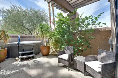 a patio with chairs and a bath tub in a yard at Pet-Friendly Borrego Springs Retreat in Borrego Springs