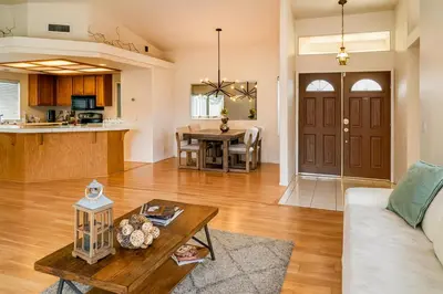 a living room with a couch and a table at Silver Sands Den in Hemet