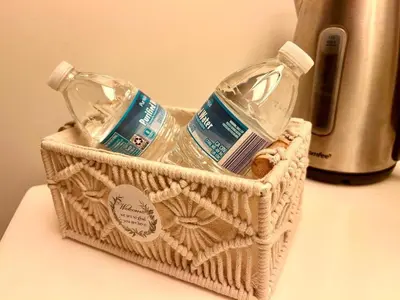a basket with two bottles of soap and a blender at Stallion Crest Suite with TV and private bathroom in Hemet