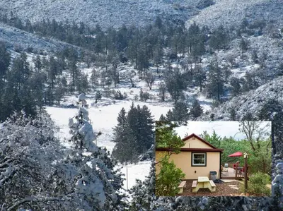 a picture of a house in the snow at Historical Cabin in Julian Pet's okay! in Julian