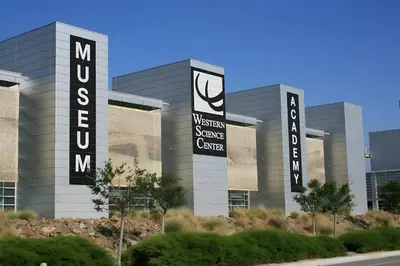 a building with signs on the side of it at Sundance Retreat in Hemet