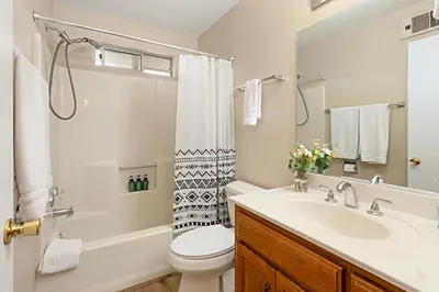 a bathroom with a sink and a toilet and a shower at Charming 2 Room La Mesa Casita w/ Pool, BBQ & Yard in La Mesa