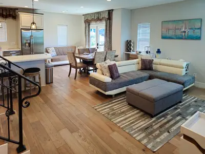 a living room with a couch and a table at Modern comfort, prime location, 360 views, 4 BR entire house in San Diego