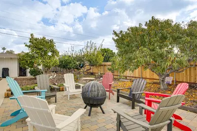 a group of chairs sitting on a patio at Breeze by the Marina Chula Vista Getaway! in Chula Vista
