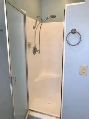 a shower with a glass door in a bathroom at Blue Whale Inn Pet and Kid Friendly Unit C in San Clemente