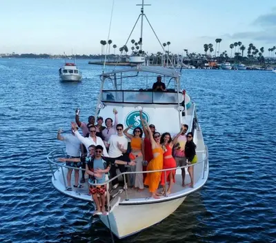 a group of people on a boat in the water at 2BR Walk to Convention Center Free Parking in San Diego