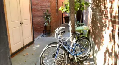 a blue bike parked next to a building at Gaslamp 2BR Suite Free Parking Convention Walk in San Diego