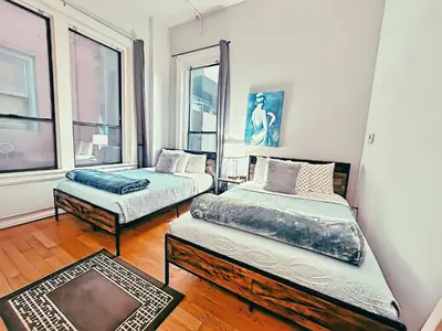 a bedroom with two beds and a window at 2BR Downtown Suite Free Parking - Conv Center in San Diego