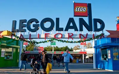 a group of people walking in front of a sign that reads leland elementary at Top Floor Conv Center Free Parking 4 Beds in San Diego