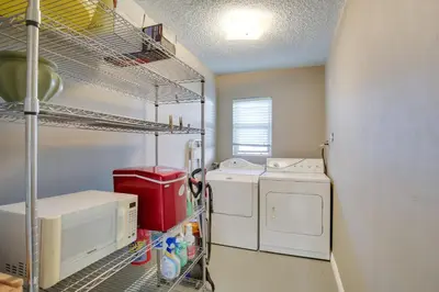 a laundry room with a washer and dryer at Oceanfront Escape Steps to Imperial Beach! in Imperial Beach