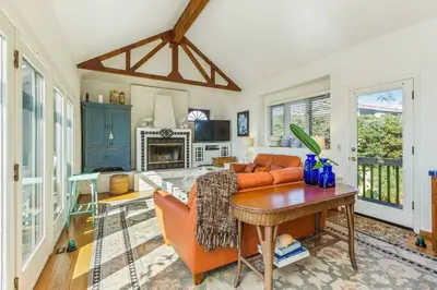 a living room with a couch and a table at Oceanview, Walk To Beach, Fire Pit in Carlsbad