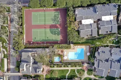 an aerial view of a house with a tennis court at Oceanfront Luxury, Fully Remodeled, Five-Star in Solana Beach