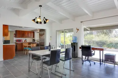 a kitchen and dining room with a table and chairs at Borrego Springs Retreat with Pool and Mtn Views in Borrego Springs