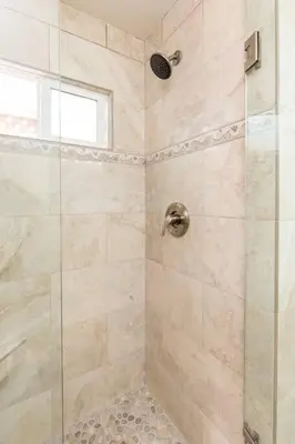 a bathroom with a shower with a glass door at Charming Hillcrest/Mission Hills 3 BR + House in San Diego