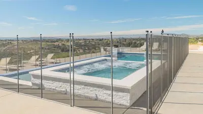 a view of a swimming pool from a house through glass at Pinot Point by AvantStay Massive Estate 10 mins from Temecula Wineries in Temecula