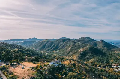 a view of the mountains from the top of a hill at Escondido Hilltop Home with Deck and Views! in Escondido