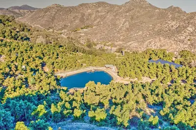 an aerial view of a bridge over a lake at Escondido Hilltop Home with Deck and Views! in Escondido