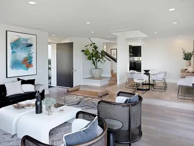 a living room with a couch and a table and chairs at Grandview Getaway, Luxury 4BR, Ocean View, Fire Pit in Encinitas